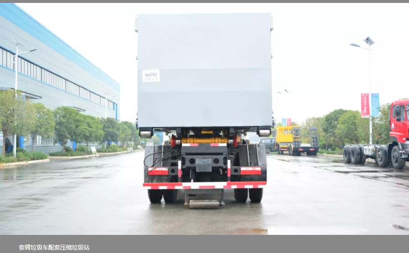 Large crane arm garbage truck