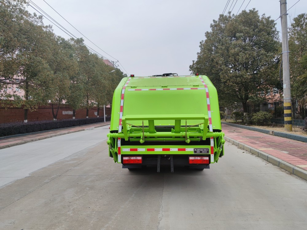 Garbage compression truck