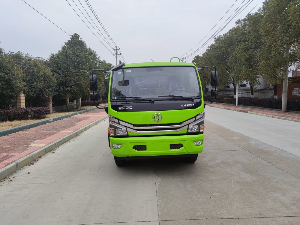 Garbage compression transfer vehicle