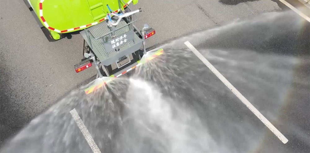 Greening sprinkler truck